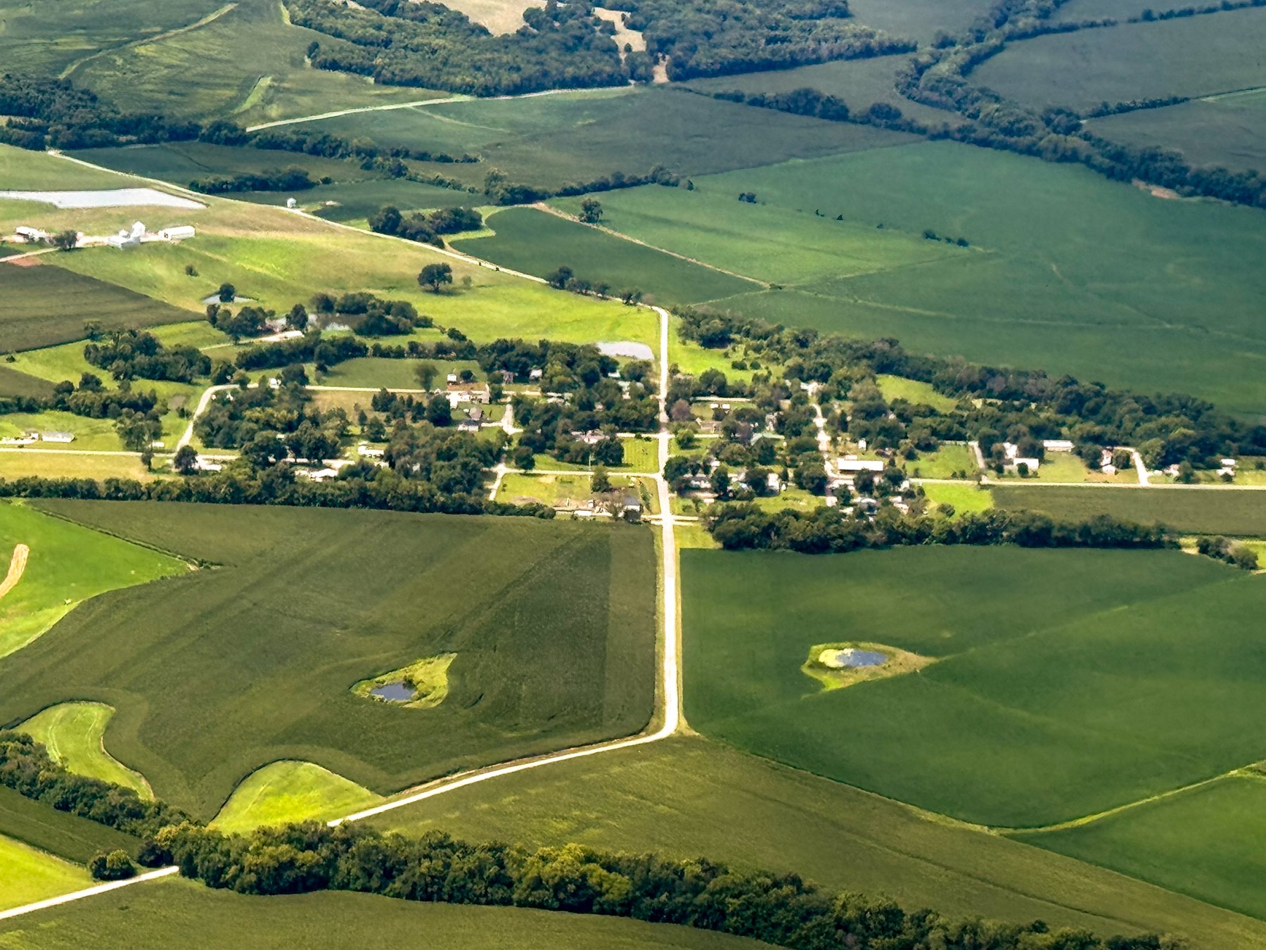 Aerial view of farmland and a small village in Lafayette County, Missouri